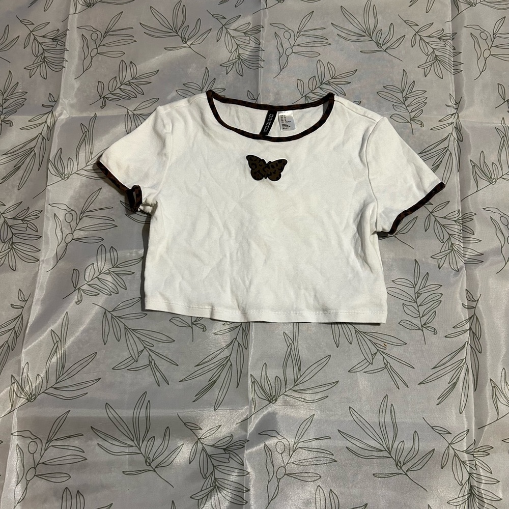 Divided leopard print babytee